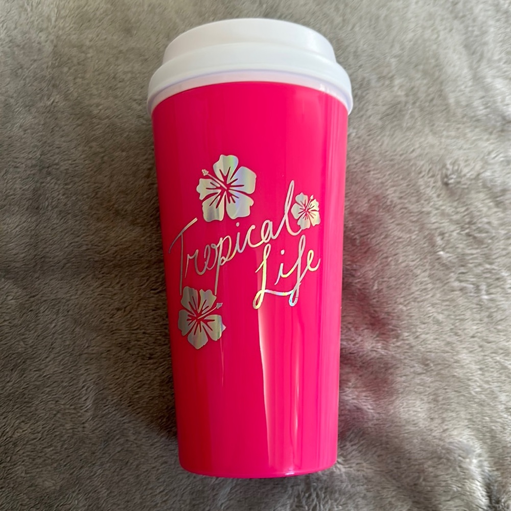 Never used pink travel cup sip thru lid